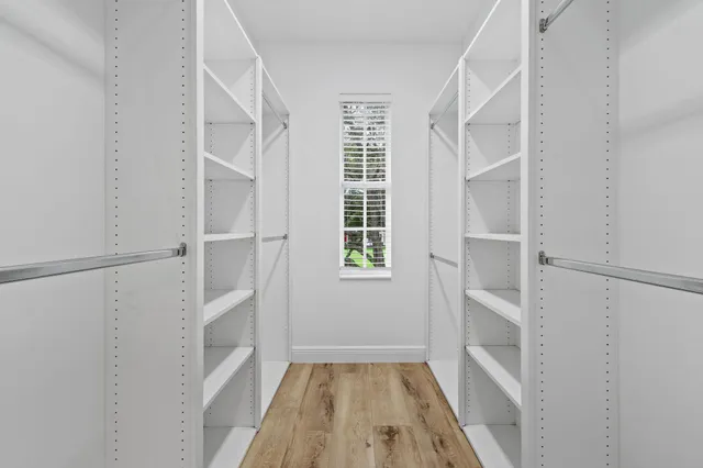 a bathroom with a sink toilet tub and shower