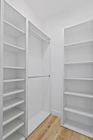 a view of a street with a building and a street light