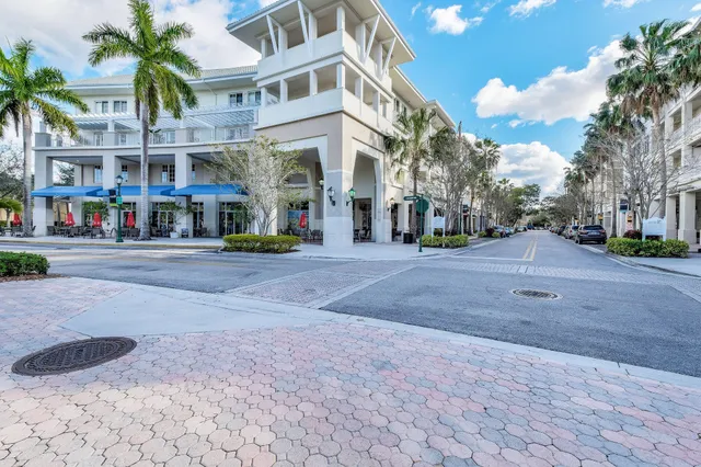 a view of a backyard with swimming pool