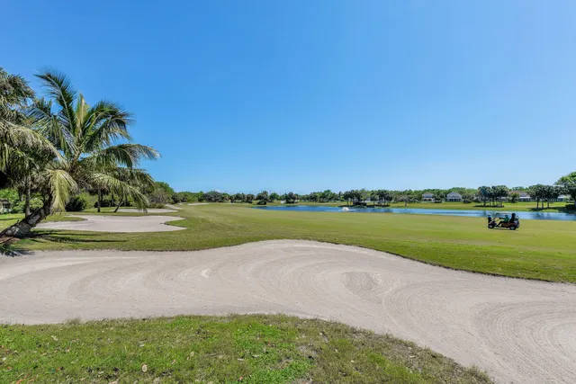 a view of a park with swings