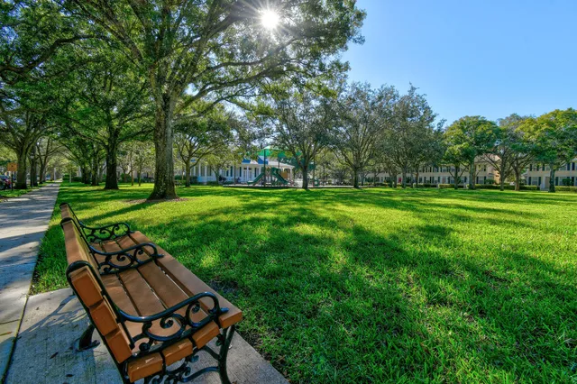 a view of a swimming pool with lounge chair