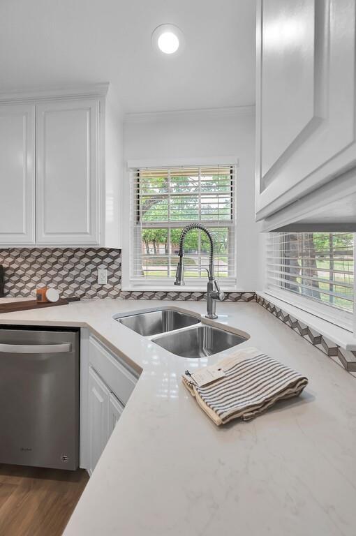 1068 Brazos Bluff Drive China Spring, TX 76633 - Photo 15 of 40 a kitchen with a sink and a large window
