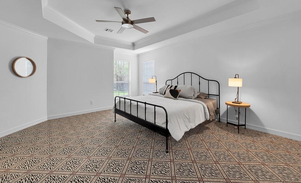 1068 Brazos Bluff Drive China Spring, TX 76633 - Photo 22 of 40 a bedroom with a bed and a chandelier
