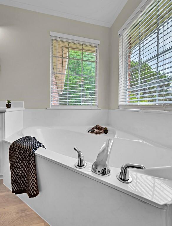 1068 Brazos Bluff Drive China Spring, TX 76633 - Photo 26 of 40 a bath tub sitting next to a window