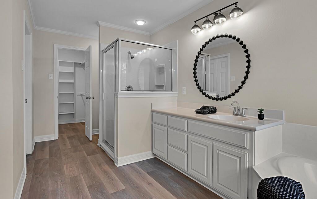 1068 Brazos Bluff Drive China Spring, TX 76633 - Photo 27 of 40 a spacious bathroom with a double vanity sink mirror and shower