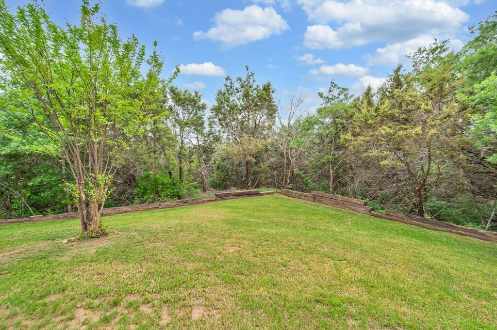 1068 Brazos Bluff Drive China Spring, TX 76633 - Photo 34 of 40 a view of a trees with a yard