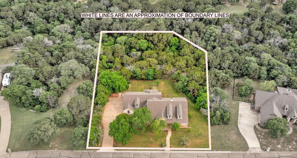 1068 Brazos Bluff Drive China Spring, TX 76633 - Photo 38 of 40 an aerial view of a house with a yard