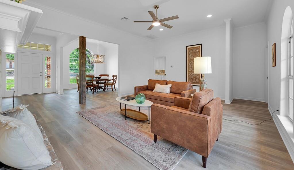 1068 Brazos Bluff Drive China Spring, TX 76633 - Photo 10 of 40 a living room with furniture and wooden floor