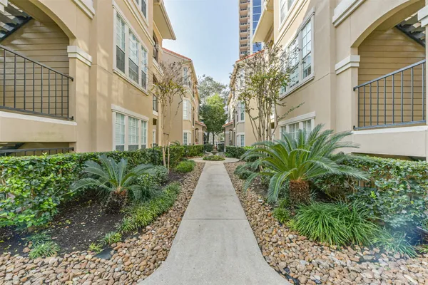 a view of a building with a street