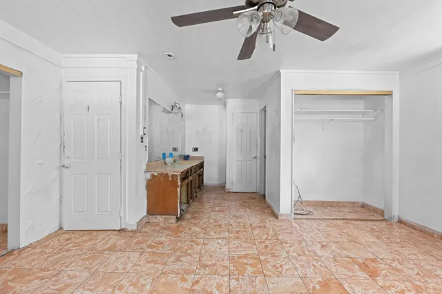 a bathroom with a shower and a window