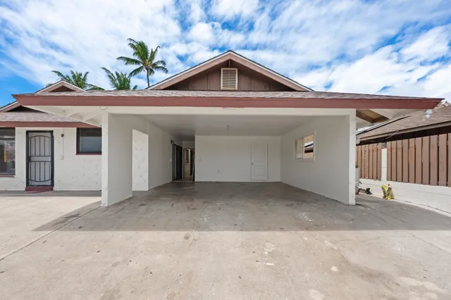 a view of a porch with furniture