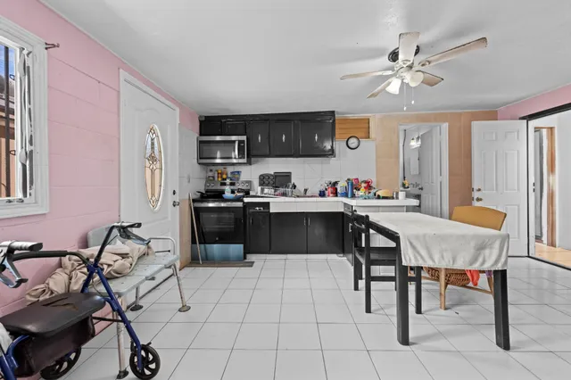 a bedroom with furniture and a window