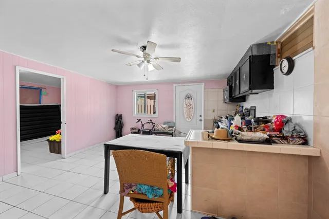 a bathroom with a sink a mirror and shower