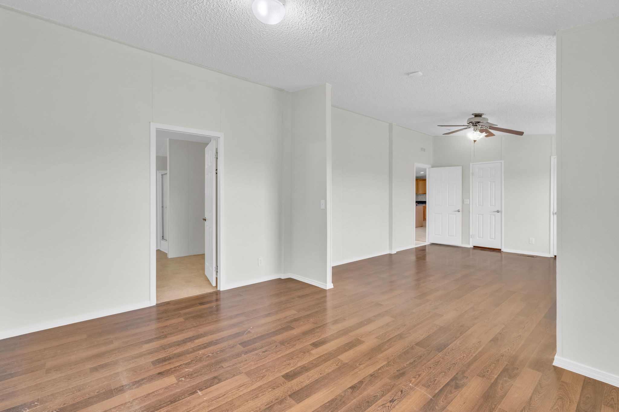 37038 Bell Road Waller, TX 77484 - Photo 23 of 43 a view of an empty room with wooden floor