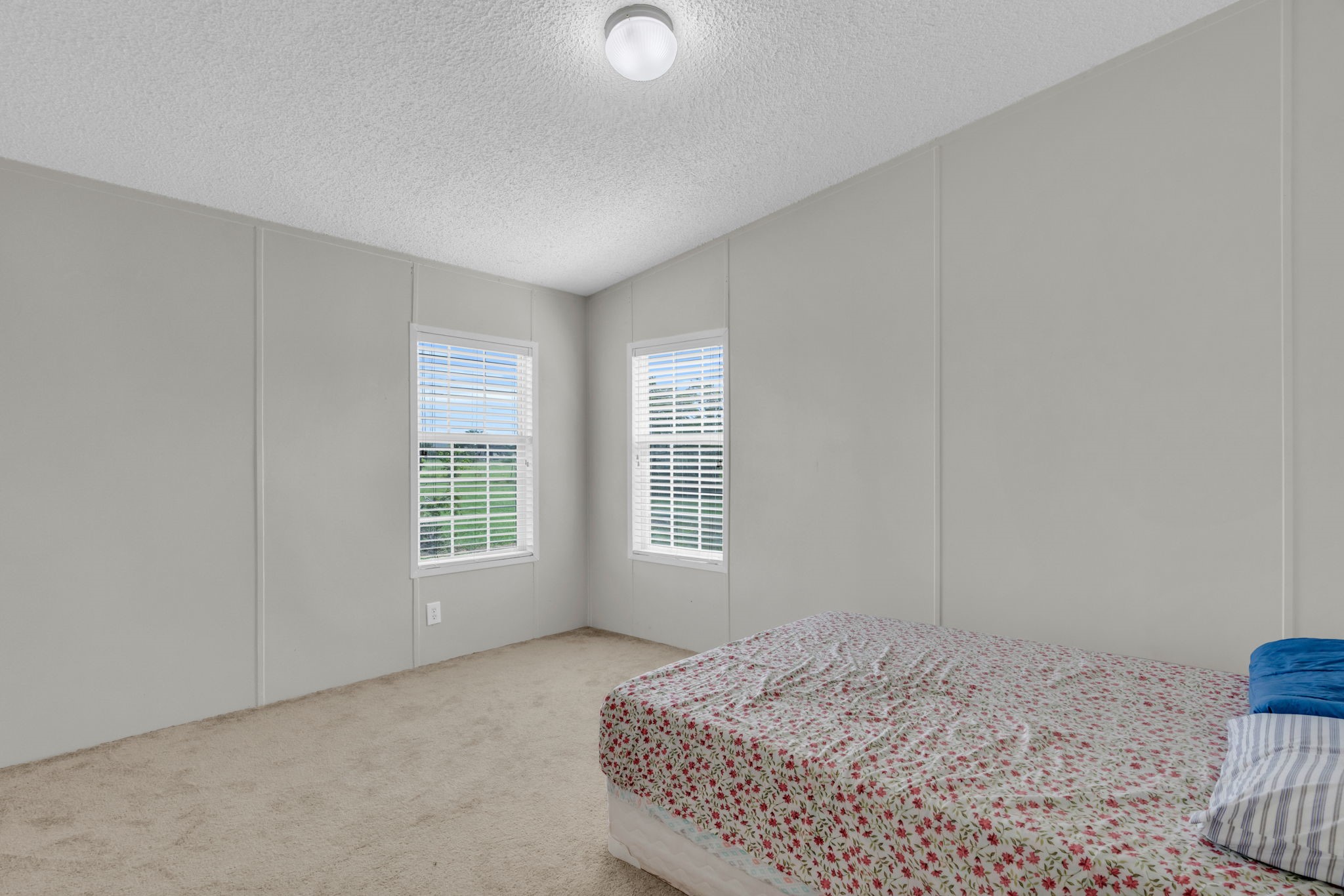 37038 Bell Road Waller, TX 77484 - Photo 26 of 43 a bedroom with a bed and a window