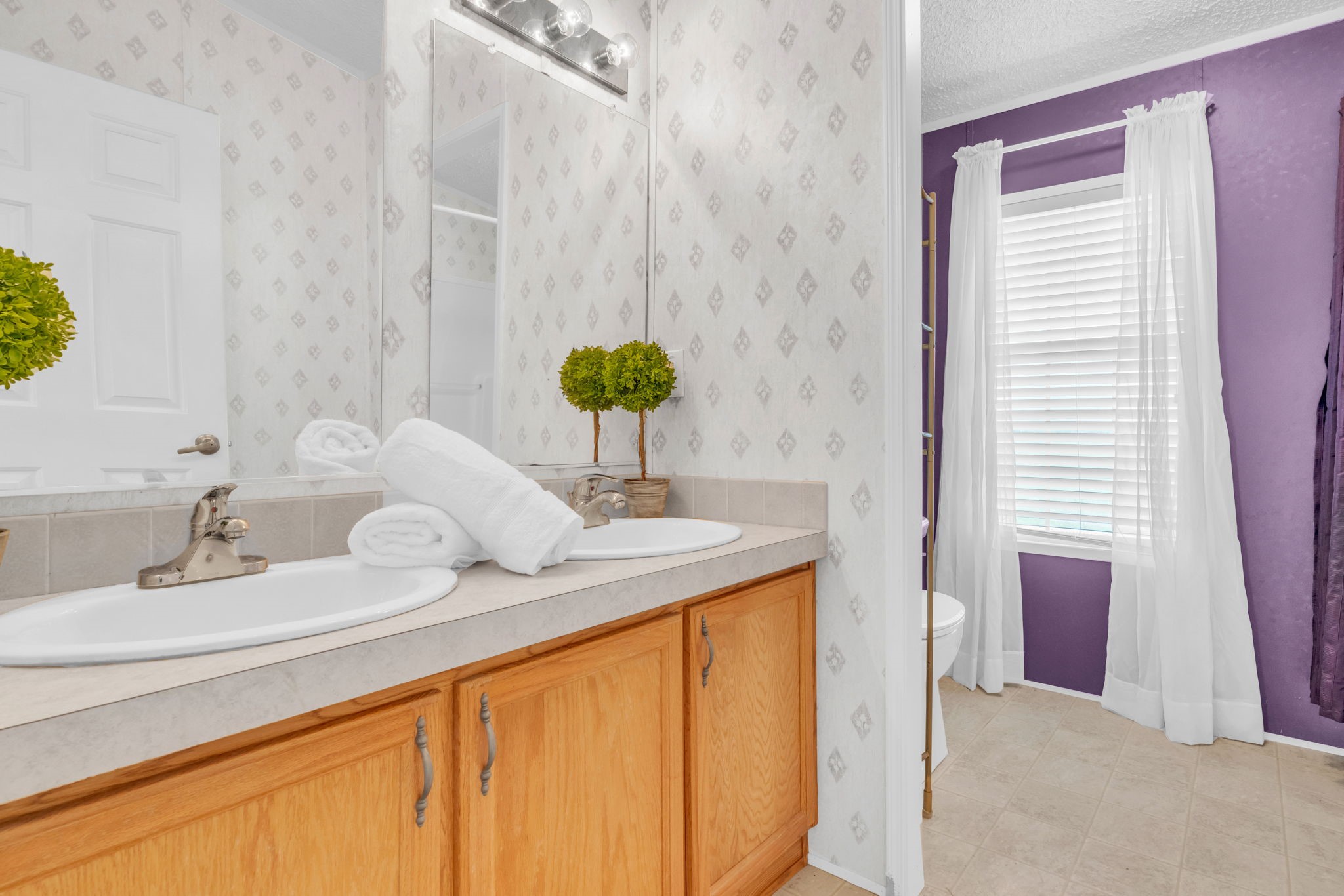 37038 Bell Road Waller, TX 77484 - Photo 30 of 43 a bathroom with a granite countertop sink and a mirror