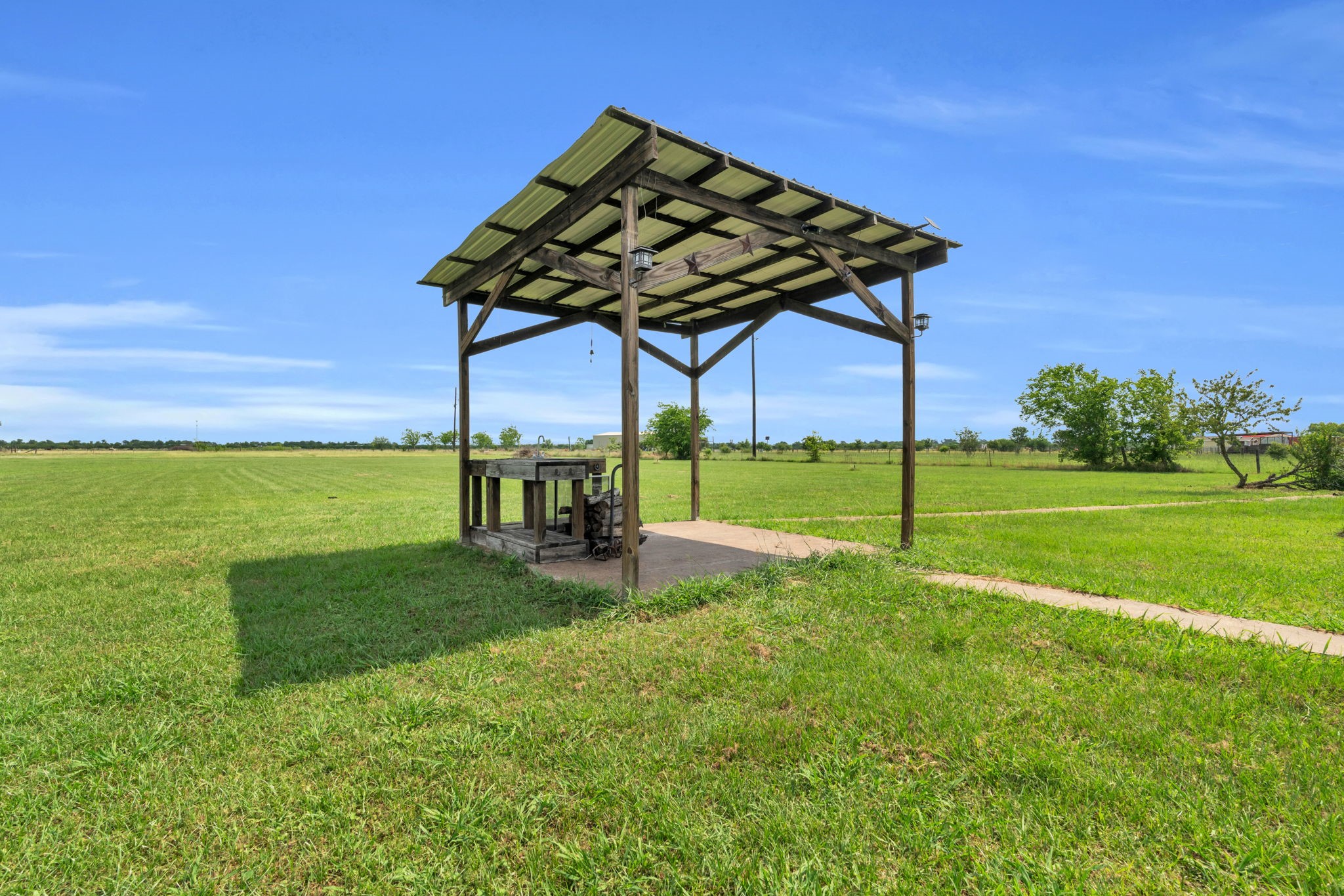 37038 Bell Road Waller, TX 77484 - Photo 35 of 43 a view of a wooden floor and roof deck