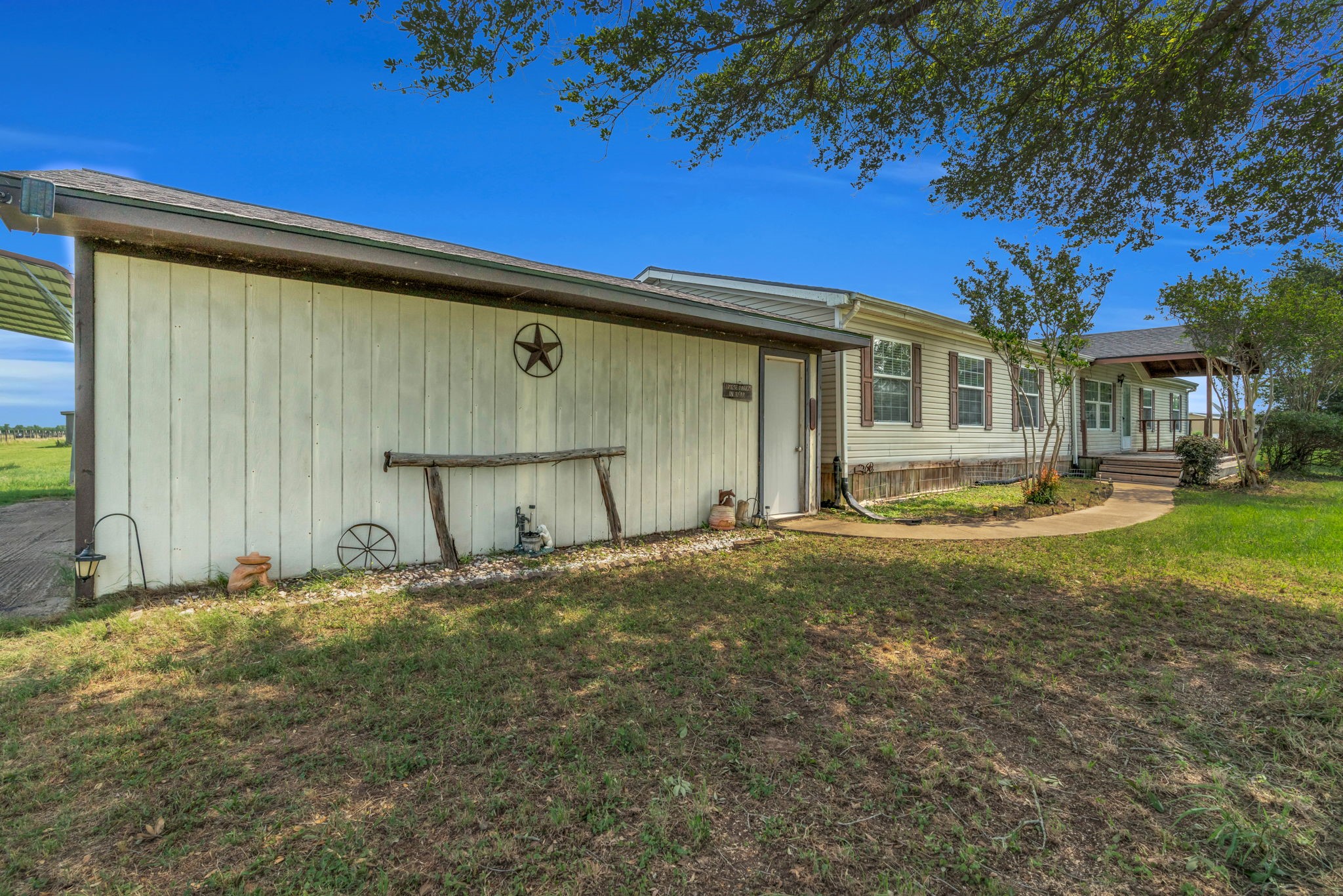 37038 Bell Road Waller, TX 77484 - Photo 7 of 43 a view of a house with backyard and trees