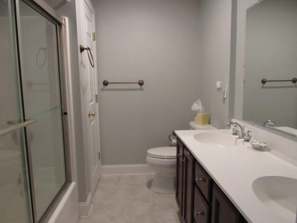 24 Leanne Way, Unit 24 Franklin, MA 02038 - Photo 12 of 18 a bathroom with a sink toilet and shower