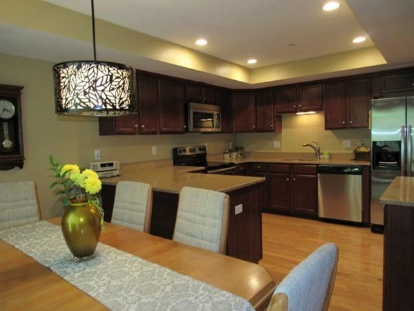 24 Leanne Way, Unit 24 Franklin, MA 02038 - Photo 6 of 18 a kitchen with a sink cabinets and window