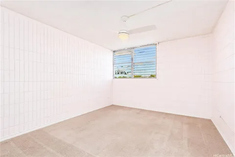 an empty room with a bathroom