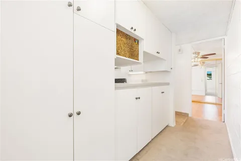 a view of a hallway with closet