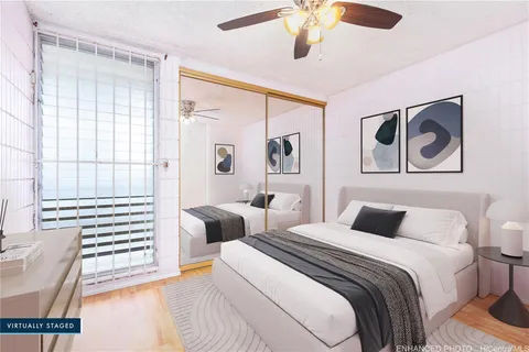 a view of a room with a flat screen tv