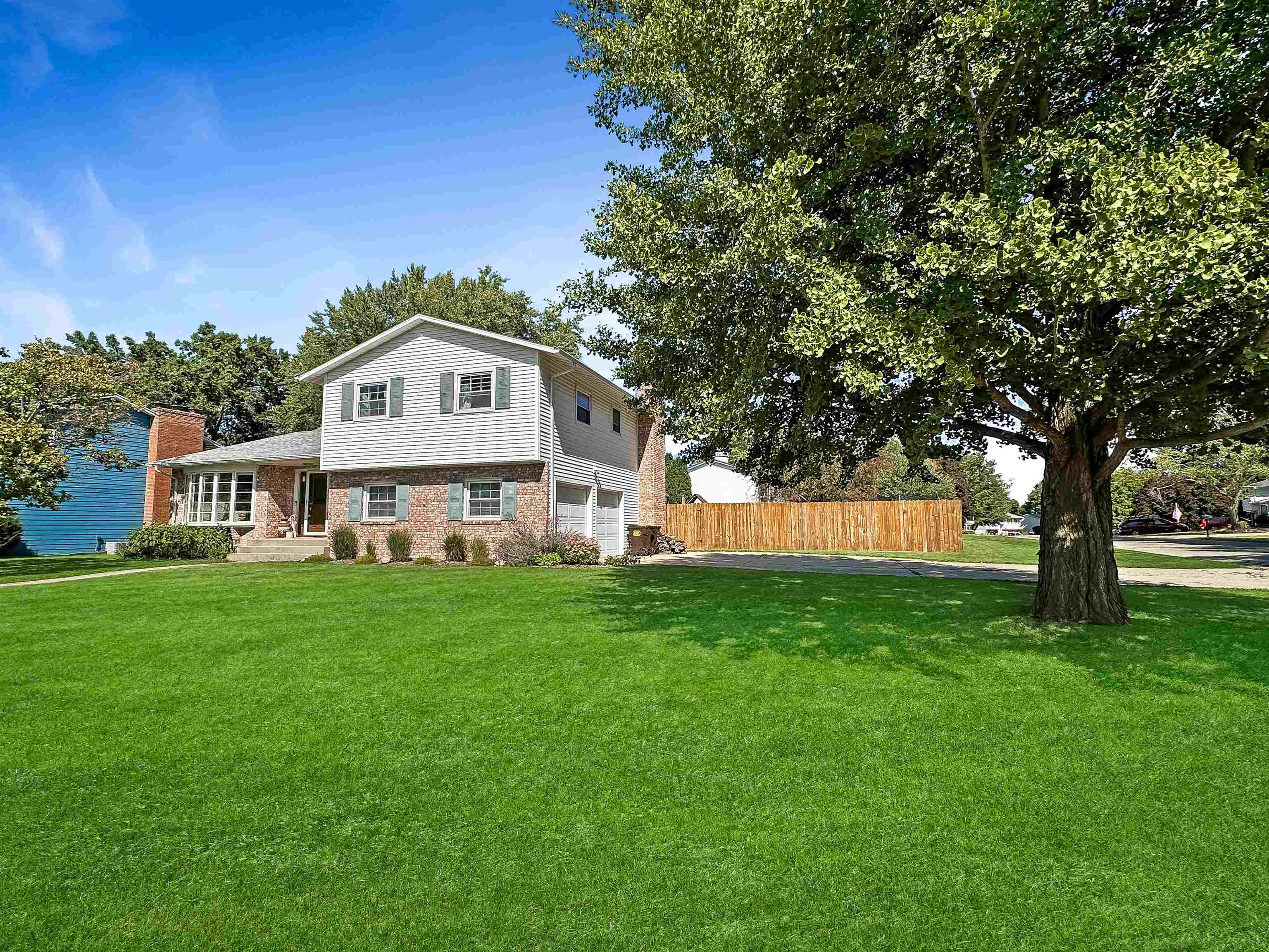 a view of a house with a big yard