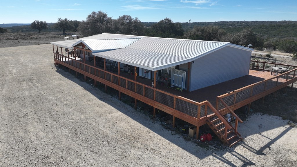 20120 Other Rocksprings, TX 78880 - Photo 5 of 22 an aerial view of a house with a big yard