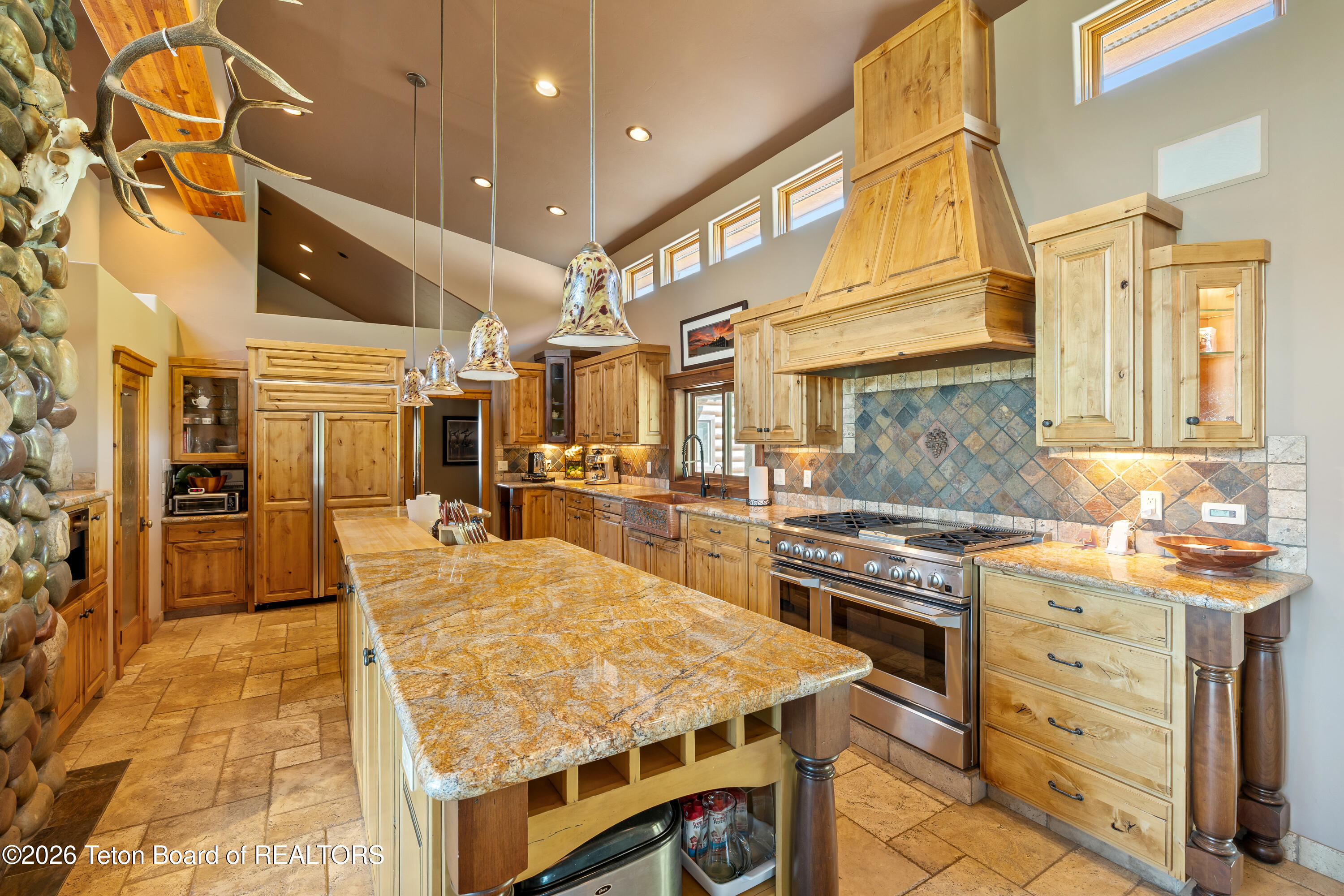 2490 La Bonte Road Jackson, WY 83001 - Photo 13 of 50 Kitchen Island and Hood