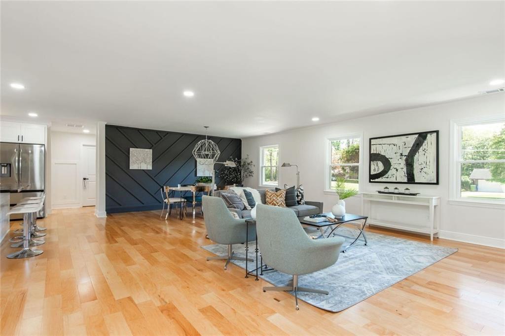 3365 Ardley Road Southwest Atlanta, GA 30311 - Photo 11 of 62 a living room with furniture and a flat screen tv