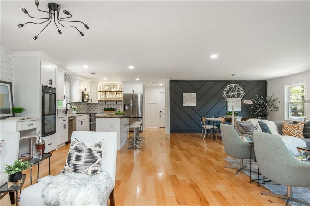 3365 Ardley Road Southwest Atlanta, GA 30311 - Photo 12 of 62 a living room with furniture and kitchen view