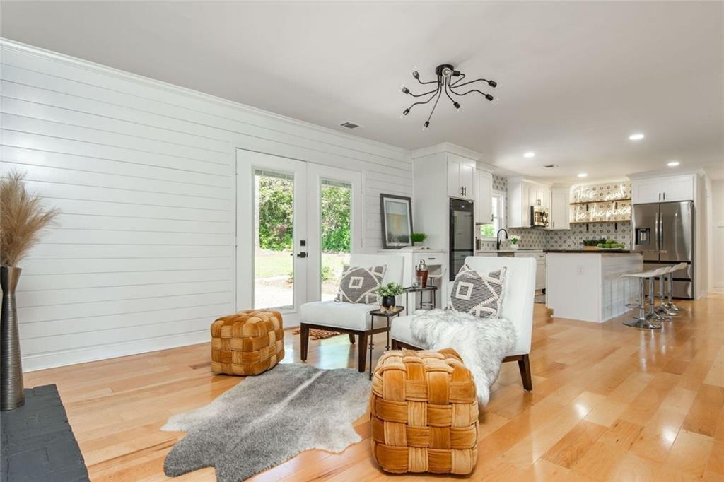 3365 Ardley Road Southwest Atlanta, GA 30311 - Photo 13 of 62 a living room with furniture and kitchen view