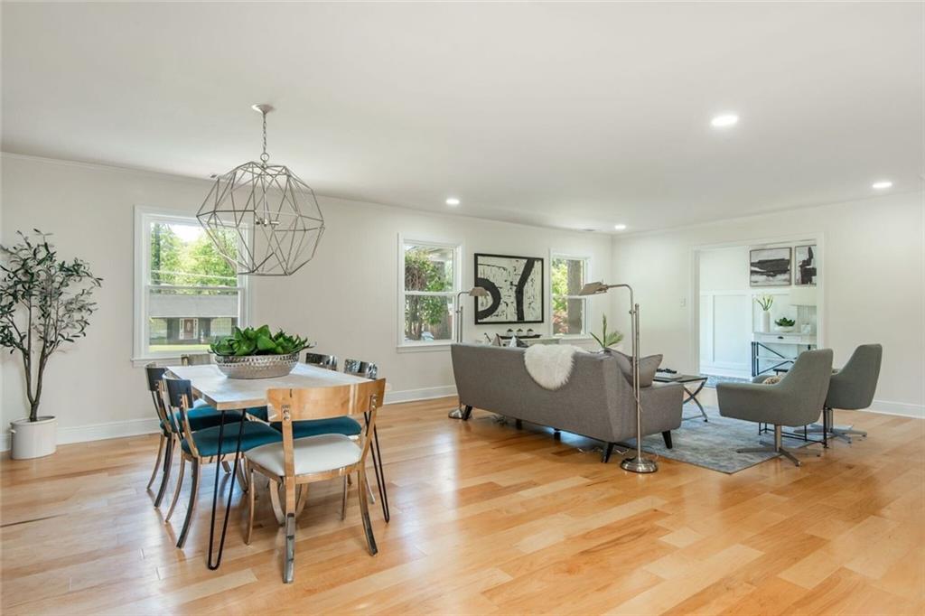 3365 Ardley Road Southwest Atlanta, GA 30311 - Photo 17 of 62 a view of a dining room with furniture window and wooden floor