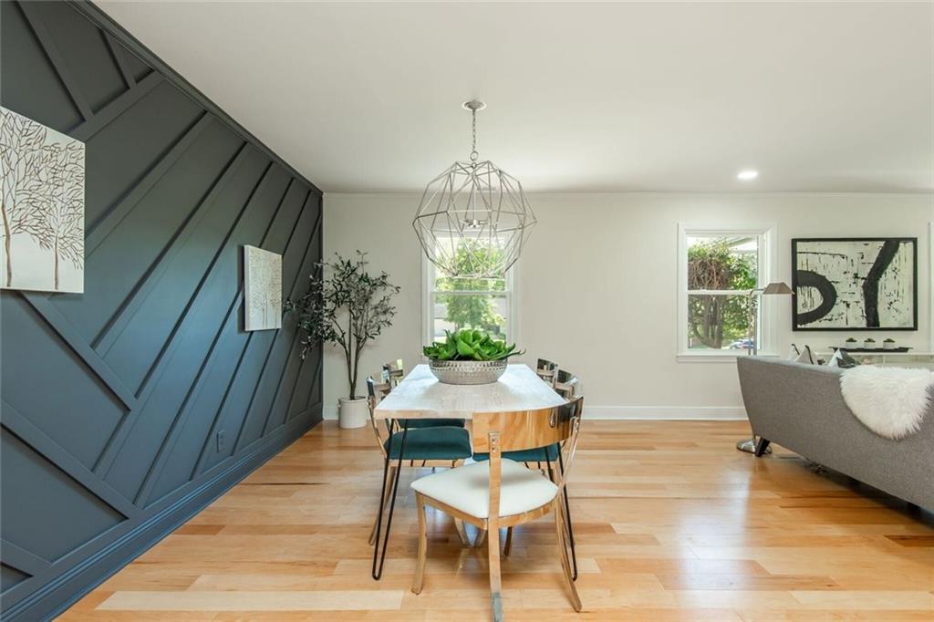 3365 Ardley Road Southwest Atlanta, GA 30311 - Photo 18 of 62 a view of a dining room with furniture window and wooden floor