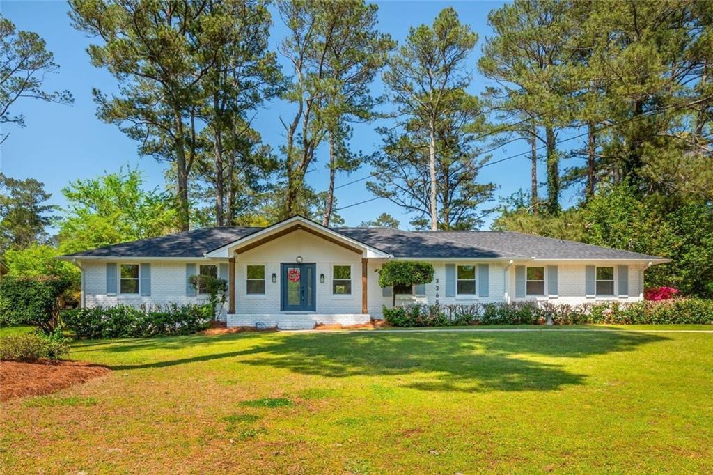 3365 Ardley Road Southwest Atlanta, GA 30311 - Photo 2 of 62 a front view of a house with swimming pool