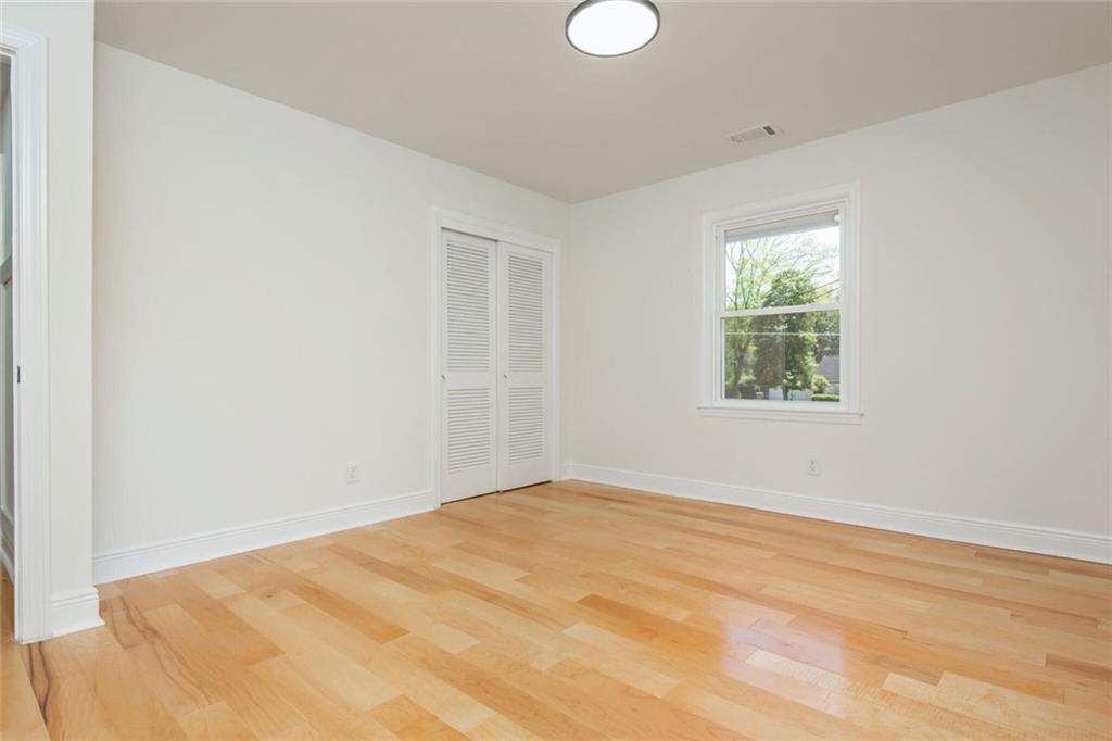 3365 Ardley Road Southwest Atlanta, GA 30311 - Photo 38 of 62 a view of empty room with wooden floor