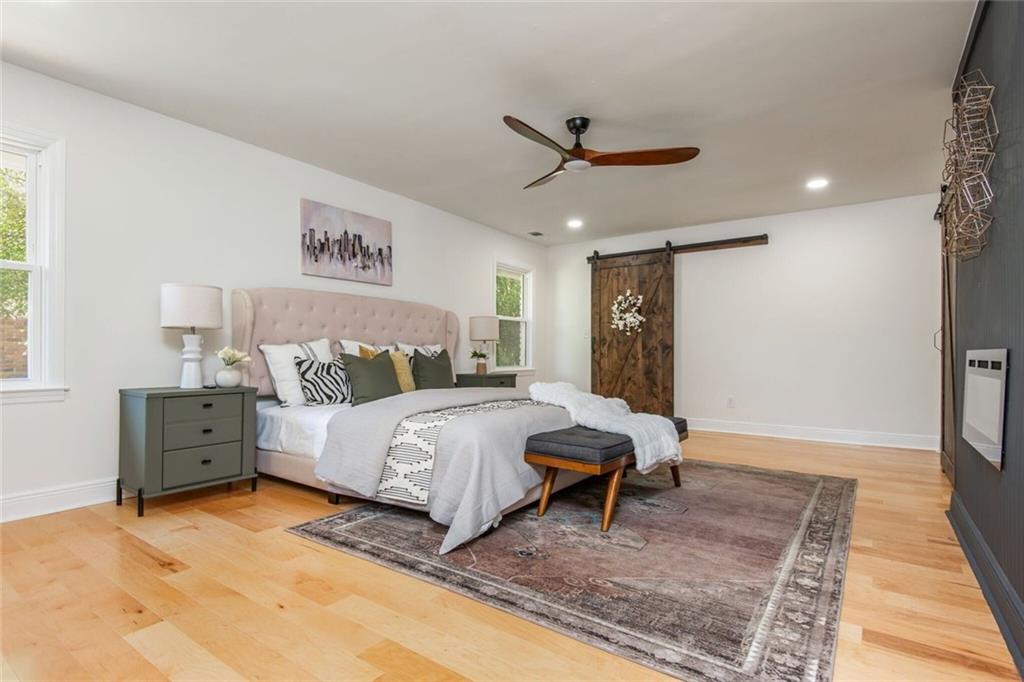 3365 Ardley Road Southwest Atlanta, GA 30311 - Photo 40 of 62 a bedroom with a bed and a rug