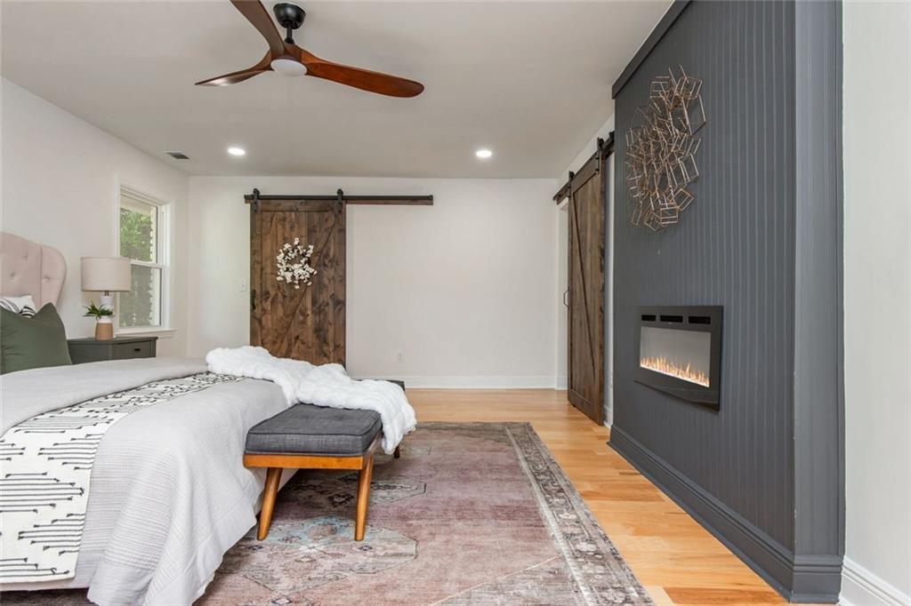 3365 Ardley Road Southwest Atlanta, GA 30311 - Photo 41 of 62 a bedroom with a bed and a mirror