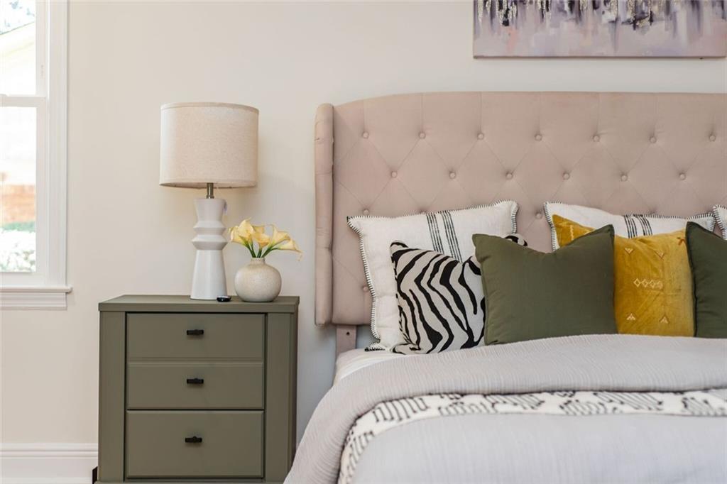 3365 Ardley Road Southwest Atlanta, GA 30311 - Photo 44 of 62 a bedroom with a bed and a table