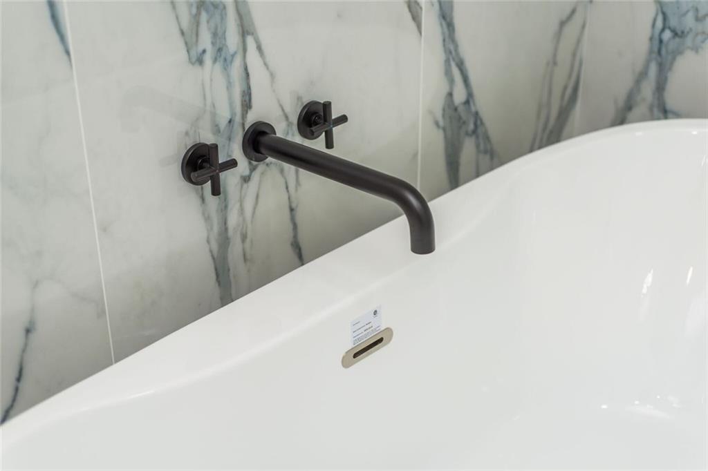 3365 Ardley Road Southwest Atlanta, GA 30311 - Photo 57 of 62 a close view of a shower in the bathroom