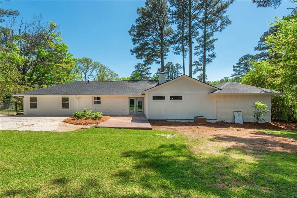 3365 Ardley Road Southwest Atlanta, GA 30311 - Photo 62 of 62 a front view of house with yard and tree in front of it
