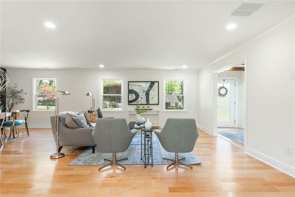 3365 Ardley Road Southwest Atlanta, GA 30311 - Photo 10 of 62 a living room with furniture a window and wooden floor