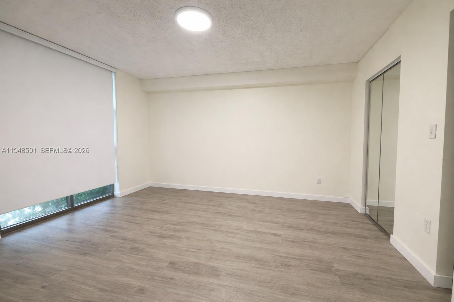 11800 Southwest 18th Street, Unit 4104 Miami, FL 33175 - Photo 4 of 10 a view of an empty room