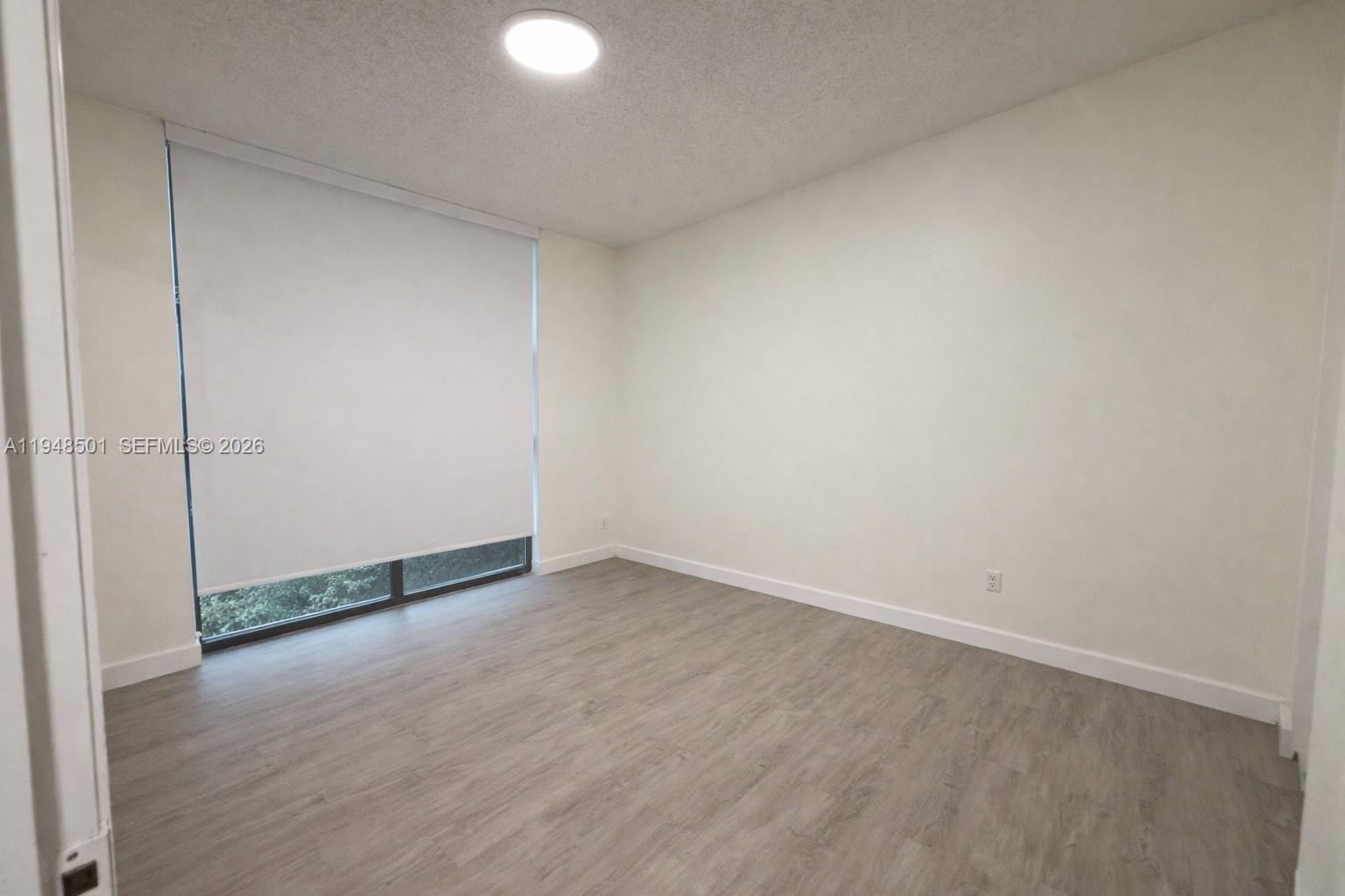 11800 Southwest 18th Street, Unit 4104 Miami, FL 33175 - Photo 9 of 10 a view of an empty room