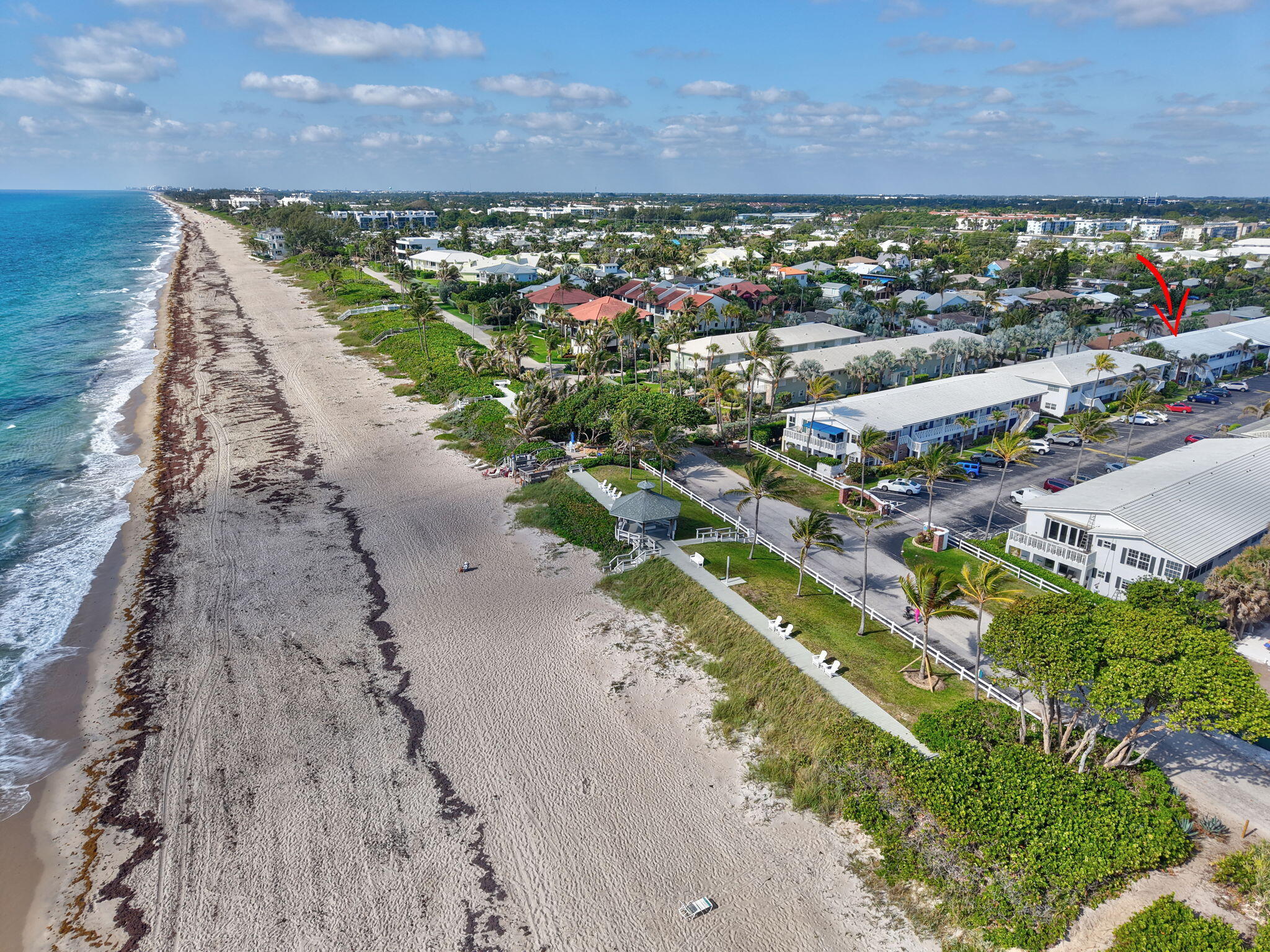 5505 North Ocean Boulevard, Unit 8202 Ocean Ridge, FL 33435 - Photo 2 of 26 a view of a lake with a building in the background
