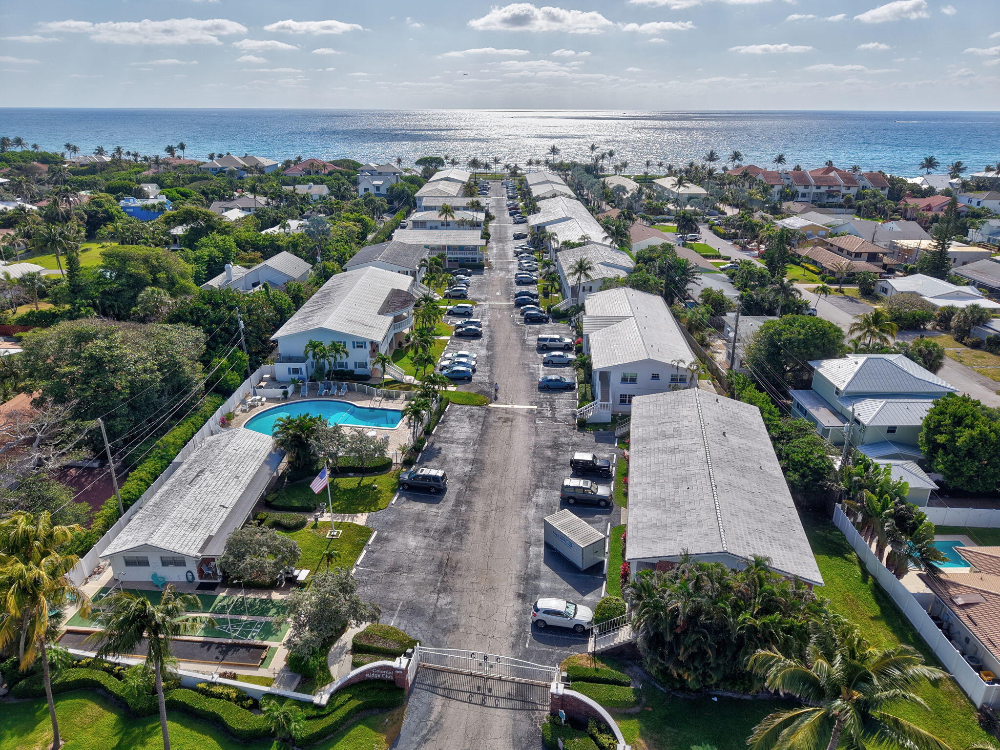 5505 North Ocean Boulevard, Unit 8202 Ocean Ridge, FL 33435 - Photo 23 of 26 an aerial view of multiple houses with yard