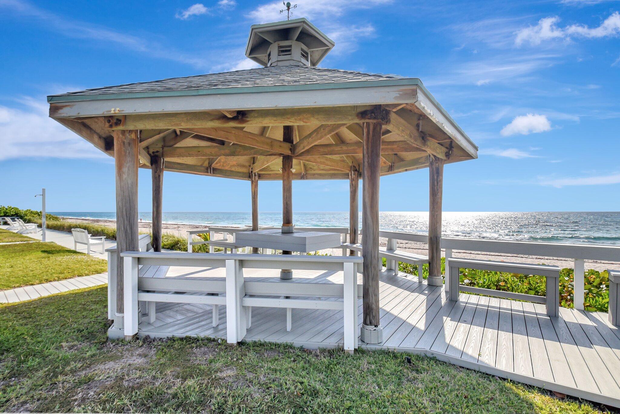 5505 North Ocean Boulevard, Unit 8202 Ocean Ridge, FL 33435 - Photo 25 of 26 a view of a backyard with plants