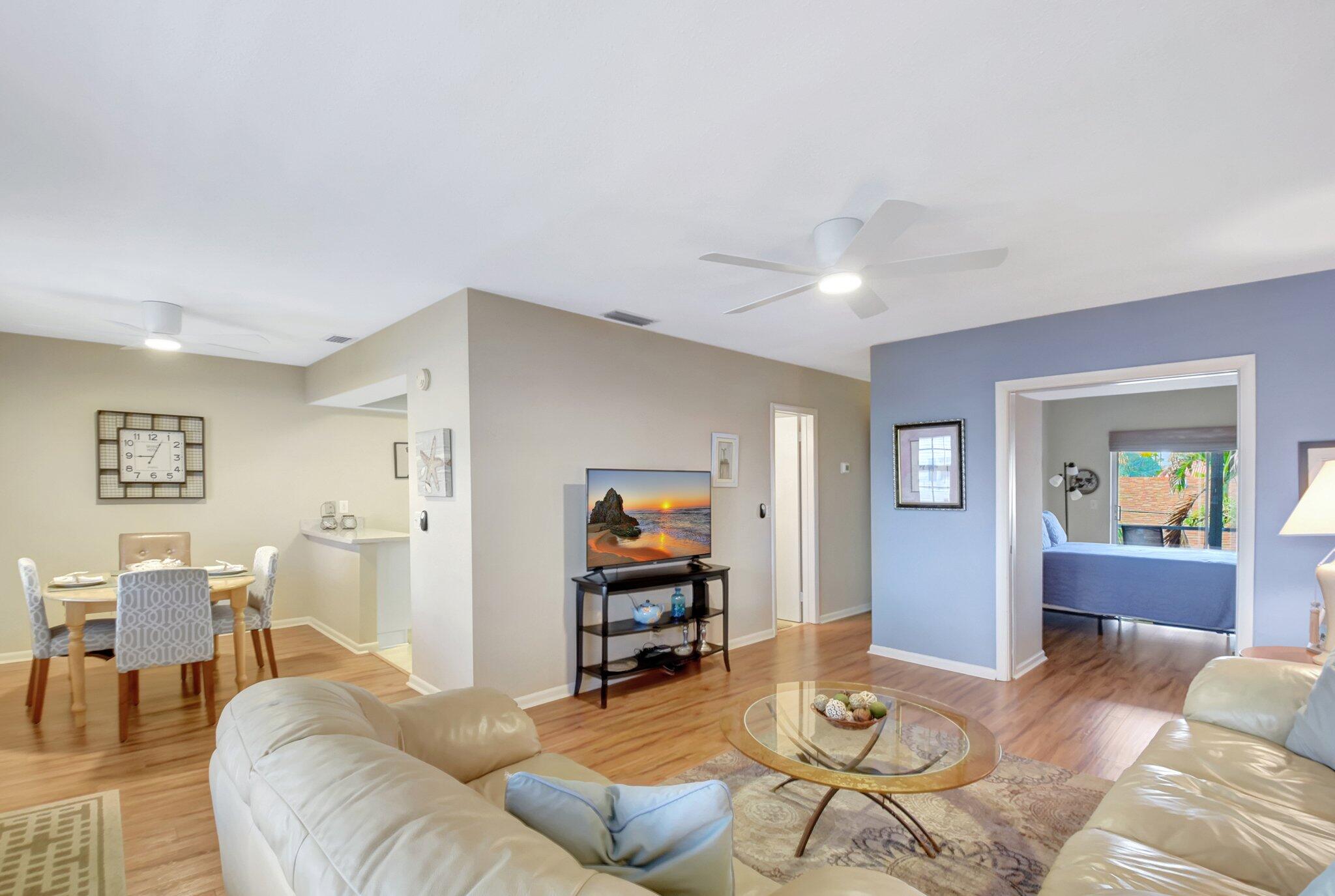 5505 North Ocean Boulevard, Unit 8202 Ocean Ridge, FL 33435 - Photo 6 of 26 a living room with furniture and wooden floor