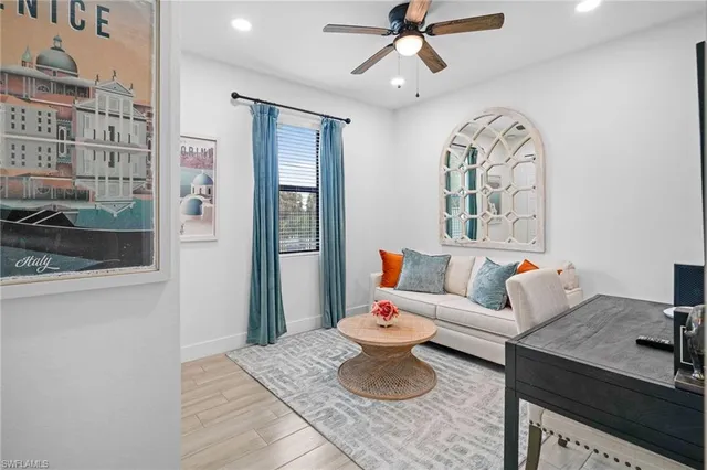 a living room with furniture and a window